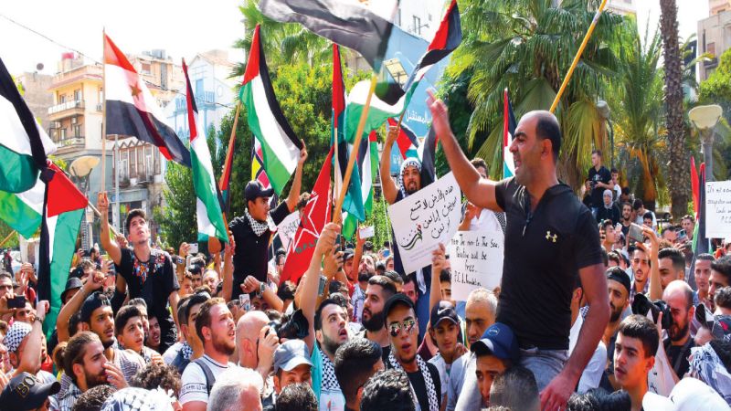هيئات سورية وفصائل فلسطينية تنظم وقفة تضامنية أمام مقر الأمم المتحدة بدمشق دعماً للشعب الفلسطيني ومقاومته
