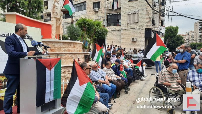 وقفة تضامنية لجرحى المقاومة الإسلامية في حي ماضي نصرة لفلسطين والقدس