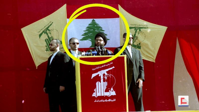 "العهد" يفضح كذبة جديدة: علم لبنان خلف السيد نصر الله!